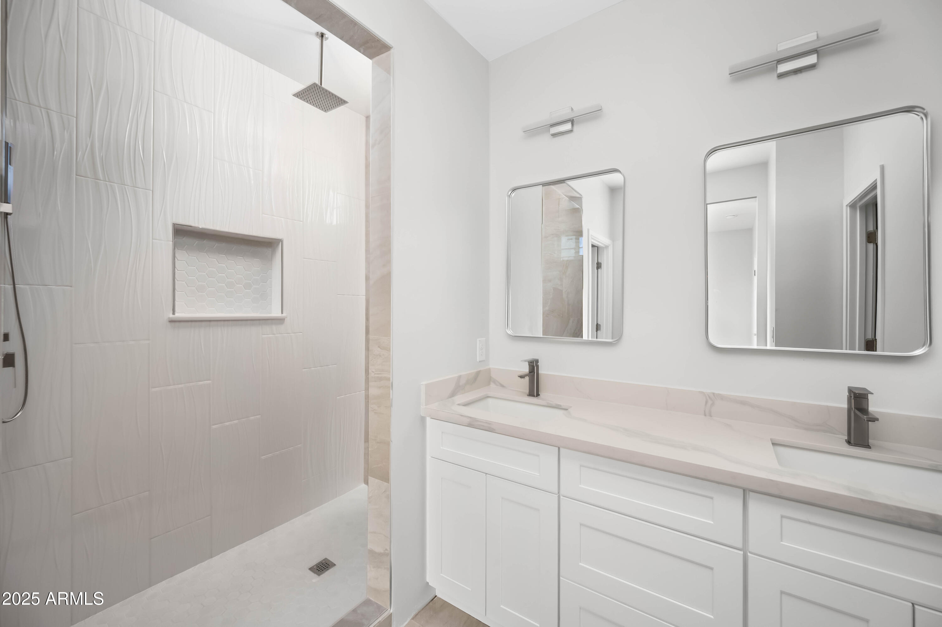 2103 Hassayampa Road Tonopah, AZ 85354 - Photo 28 of 37 a bathroom with a tub sink and mirror