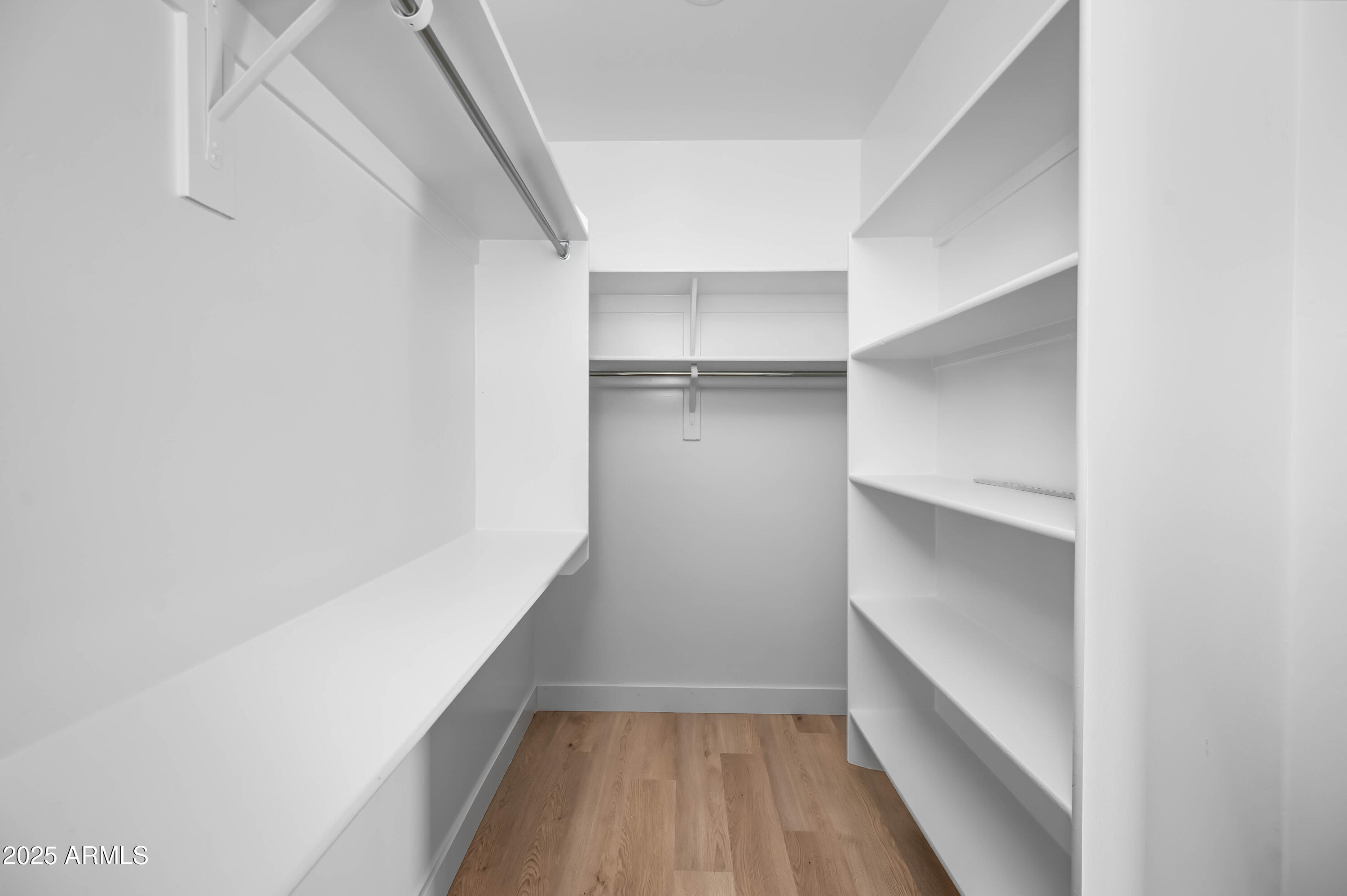 2103 Hassayampa Road Tonopah, AZ 85354 - Photo 29 of 37 a view of walk in closet with empty racks