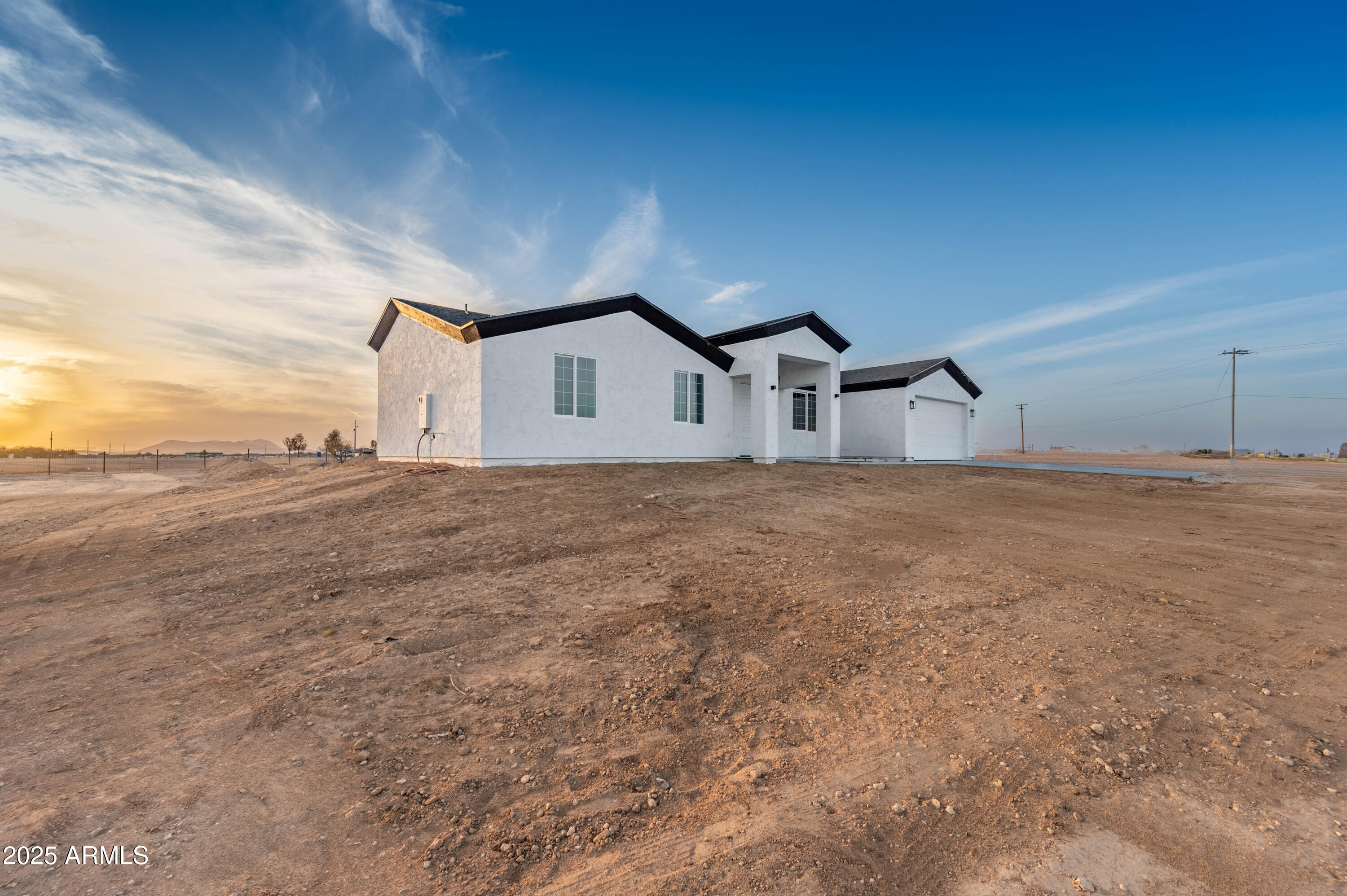 2103 Hassayampa Road Tonopah, AZ 85354 - Photo 3 of 37 a view of a house with a big yard