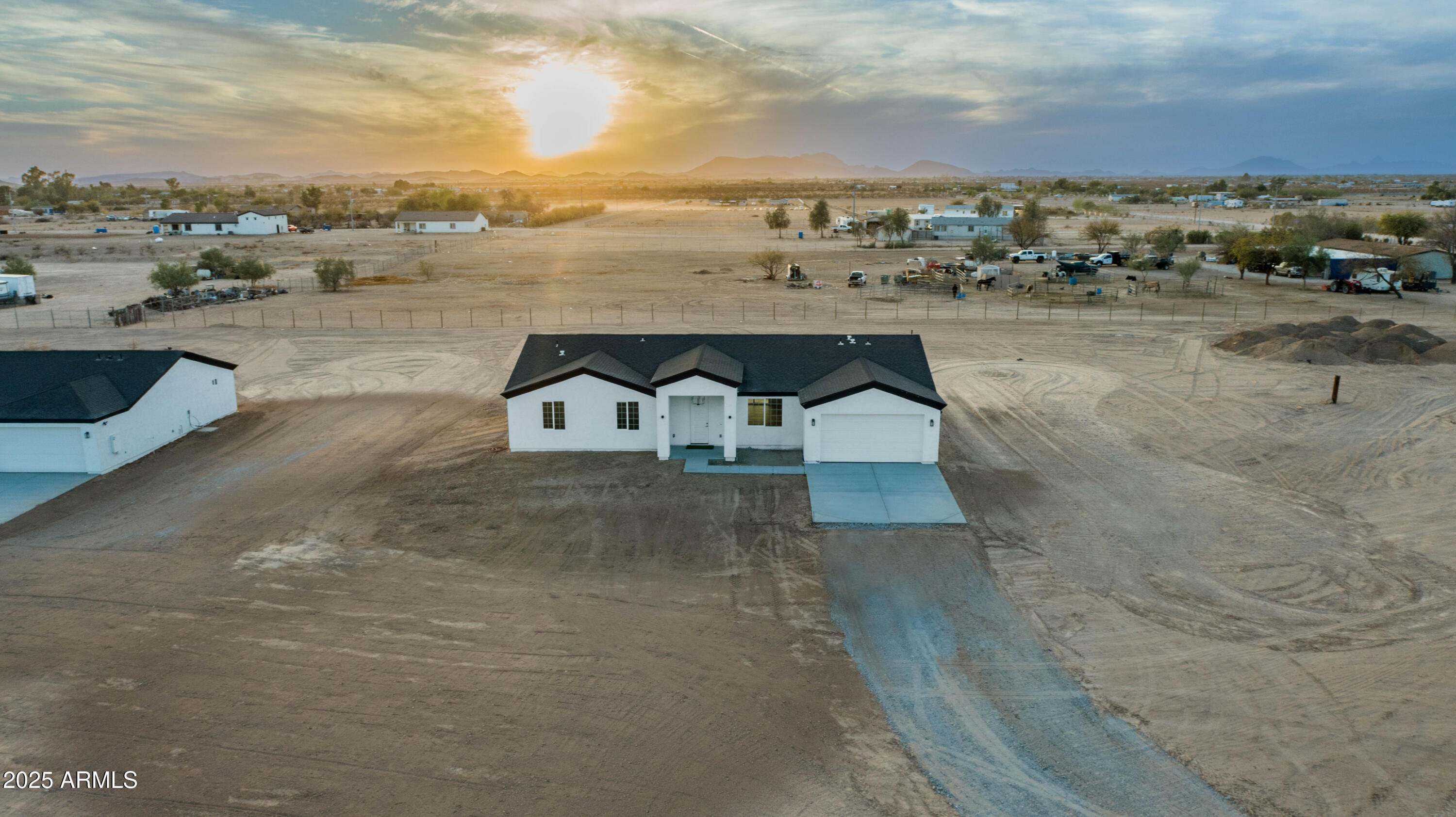 2103 Hassayampa Road Tonopah, AZ 85354 - Photo 8 of 37 a view of a lake with a car parked on the road