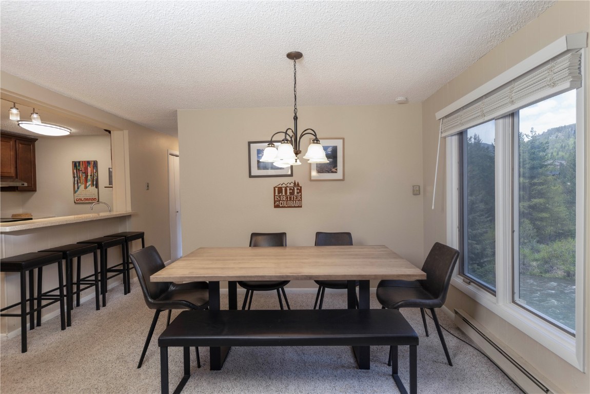 1493 East Keystone Road, Unit 2957 Keystone, CO 80435 - Photo 9 of 28 Dining area with view of the river