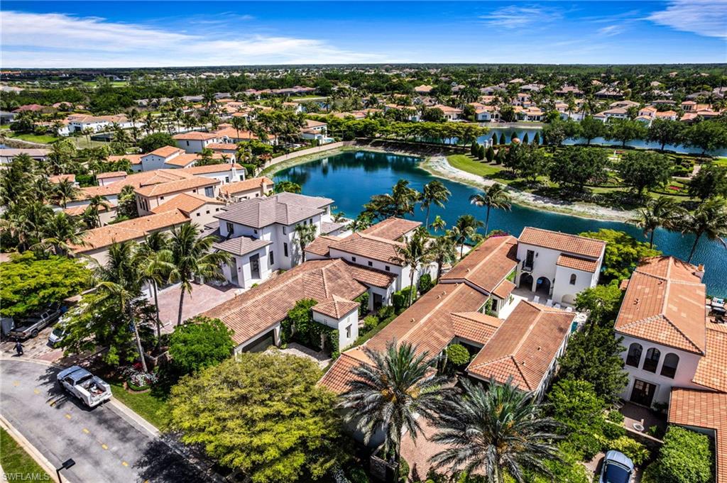 16755 Lucarno Way Naples, FL 34110 - Photo 36 of 50 an aerial view of residential houses with outdoor space
