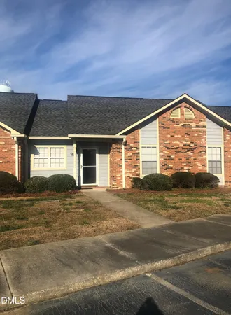 a view of a house with a ocean view