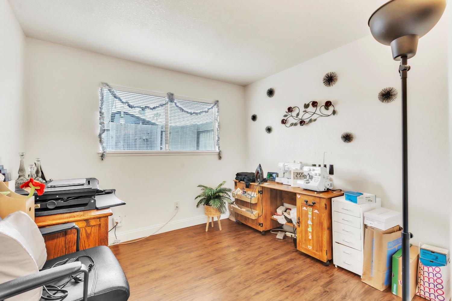 10973 Hirschfeld Way Rancho Cordova, CA 95670 - Photo 12 of 41 a living room with furniture and wooden floor