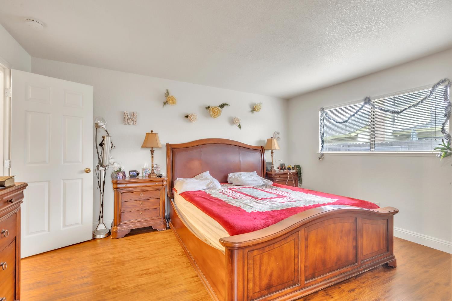 10973 Hirschfeld Way Rancho Cordova, CA 95670 - Photo 15 of 41 a bed room with a bed and a chair