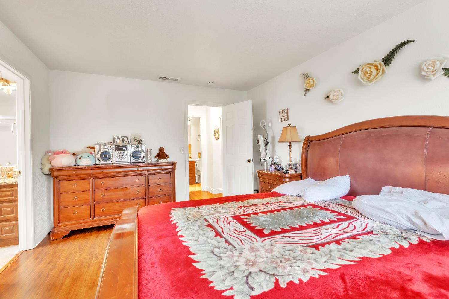 10973 Hirschfeld Way Rancho Cordova, CA 95670 - Photo 16 of 41 a bedroom with a bed and dresser