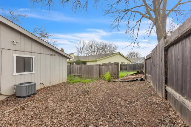 a view of a backyard with a barn