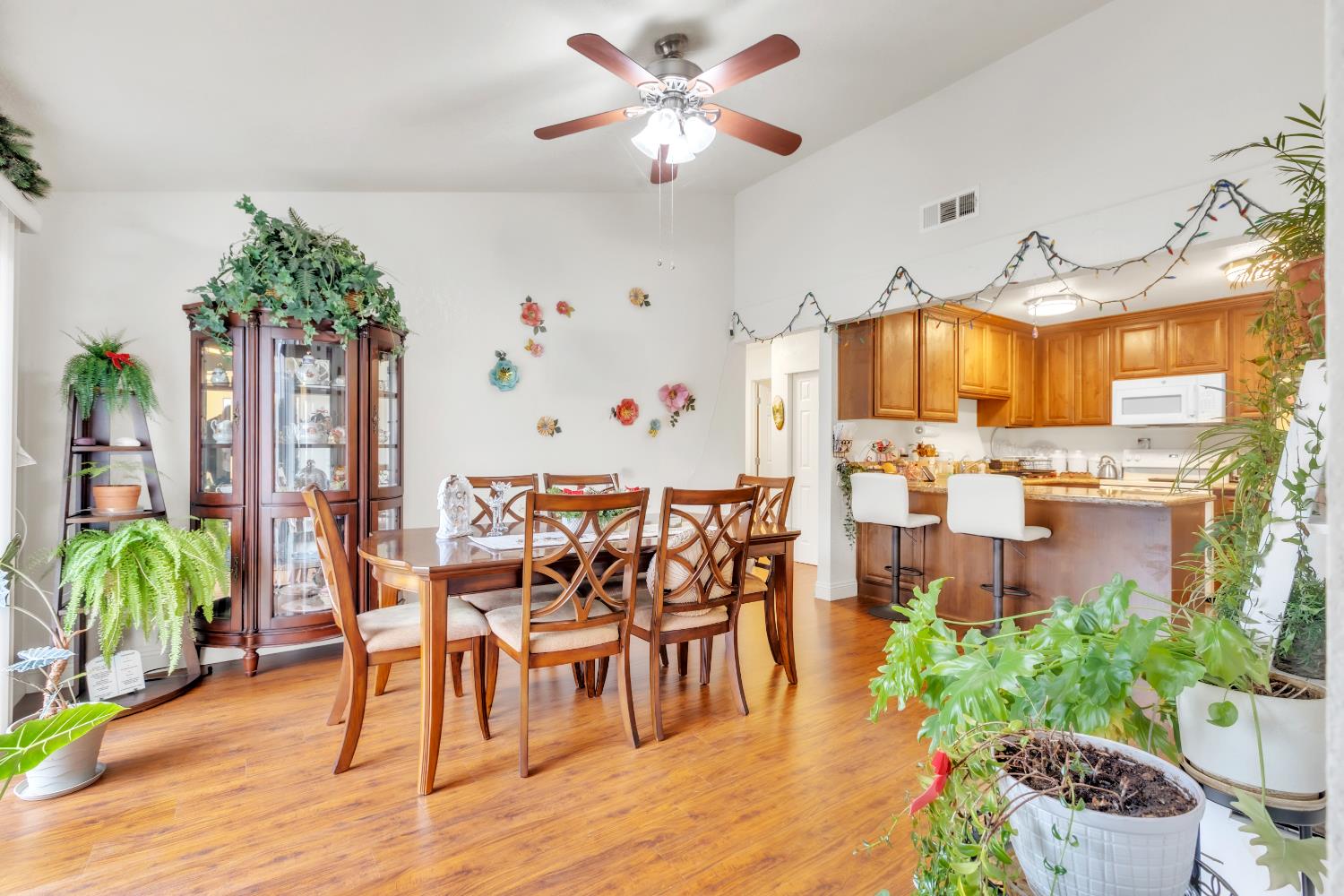 10973 Hirschfeld Way Rancho Cordova, CA 95670 - Photo 6 of 41 a view of a dining room with furniture window and wooden floor