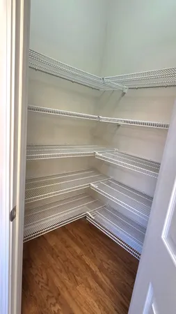 a view of a room with racks on the wall