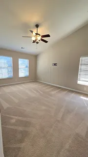 a view of a room with racks on the wall