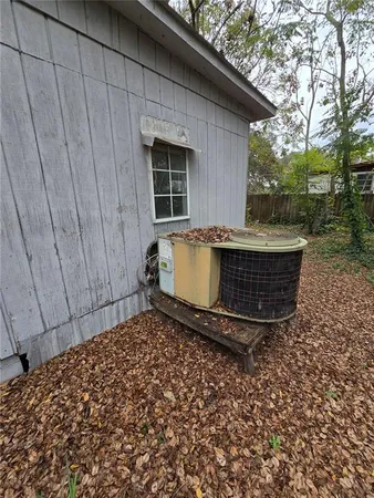 a view of a back yard of the house