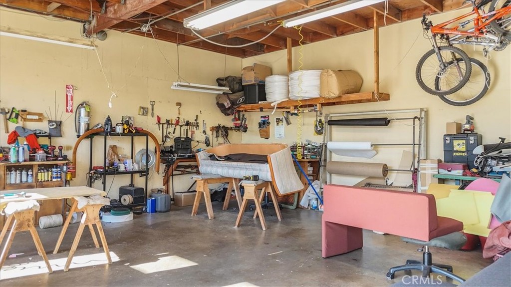 9706 Alondra Boulevard Bellflower, CA 90706 - Photo 15 of 24 a view of a chairs and tables in a patio