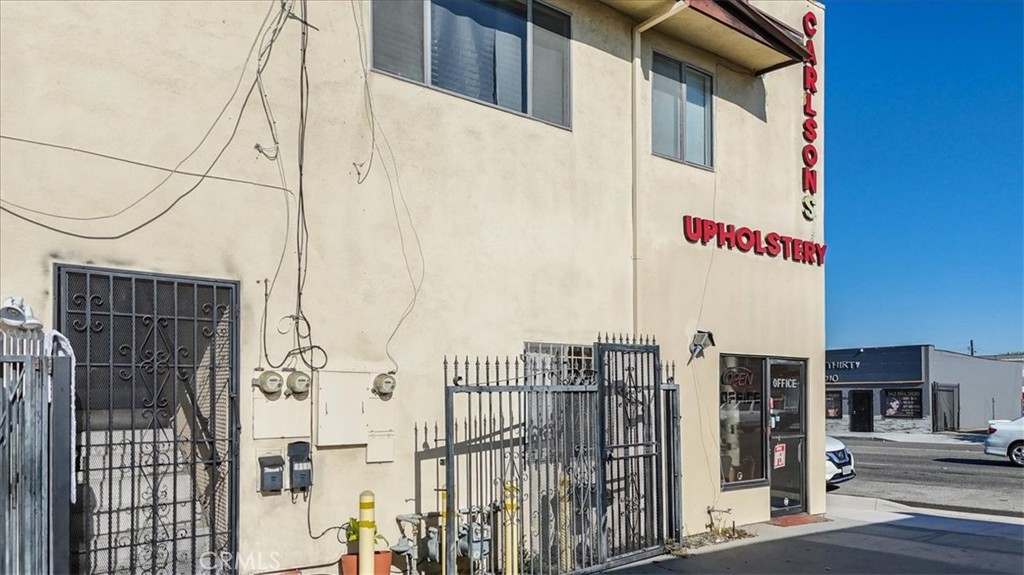 9706 Alondra Boulevard Bellflower, CA 90706 - Photo 16 of 24 a street sign on a street