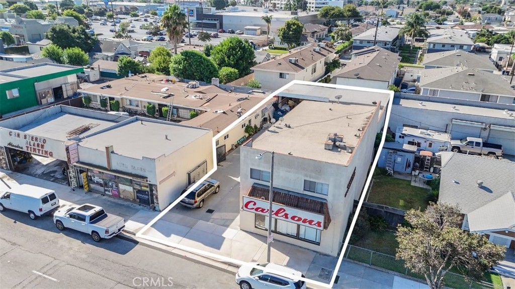 9706 Alondra Boulevard Bellflower, CA 90706 - Photo 22 of 24 an aerial view of a house with outdoor space