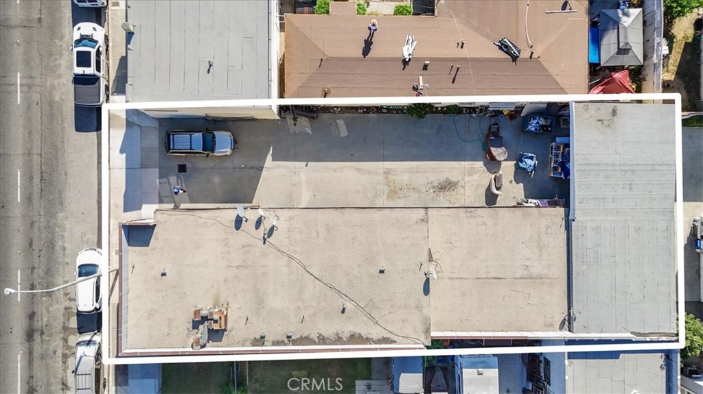 9706 Alondra Boulevard Bellflower, CA 90706 - Photo 24 of 24 an aerial view of residential houses with outdoor space