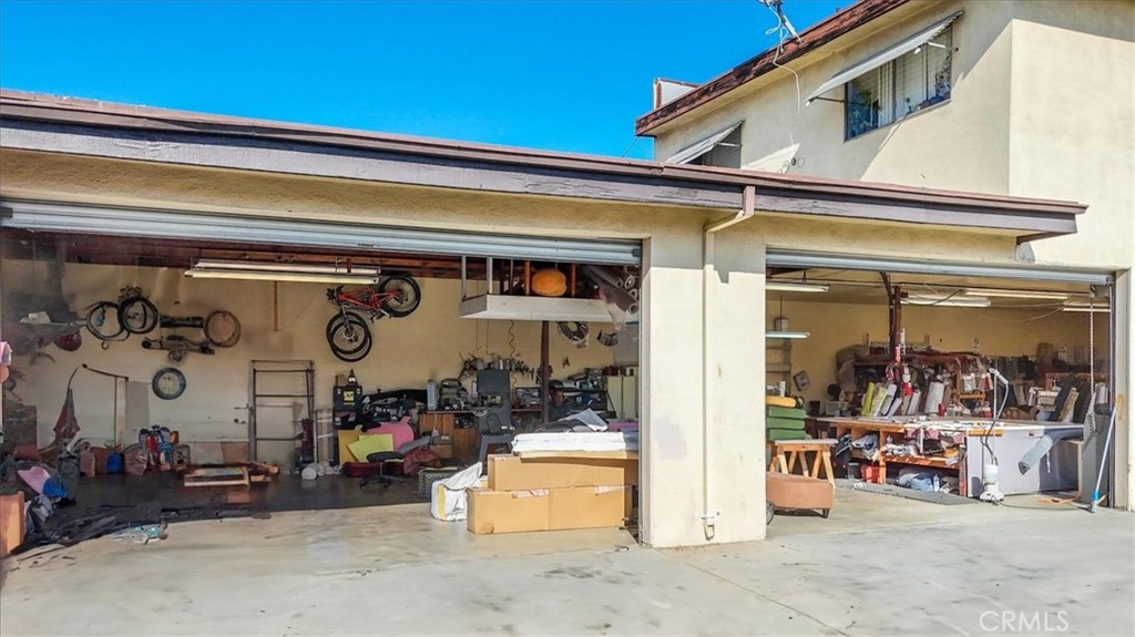 9706 Alondra Boulevard Bellflower, CA 90706 - Photo 4 of 24 a view of a garage with rack and bicycle