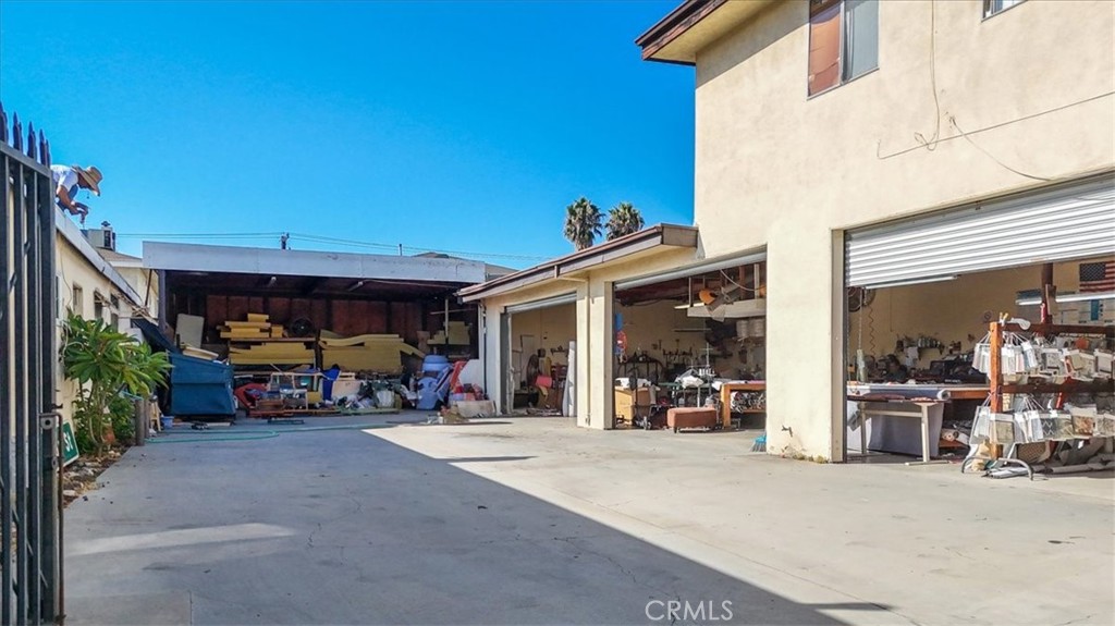 9706 Alondra Boulevard Bellflower, CA 90706 - Photo 5 of 24 a view of a chairs in front of retail shop
