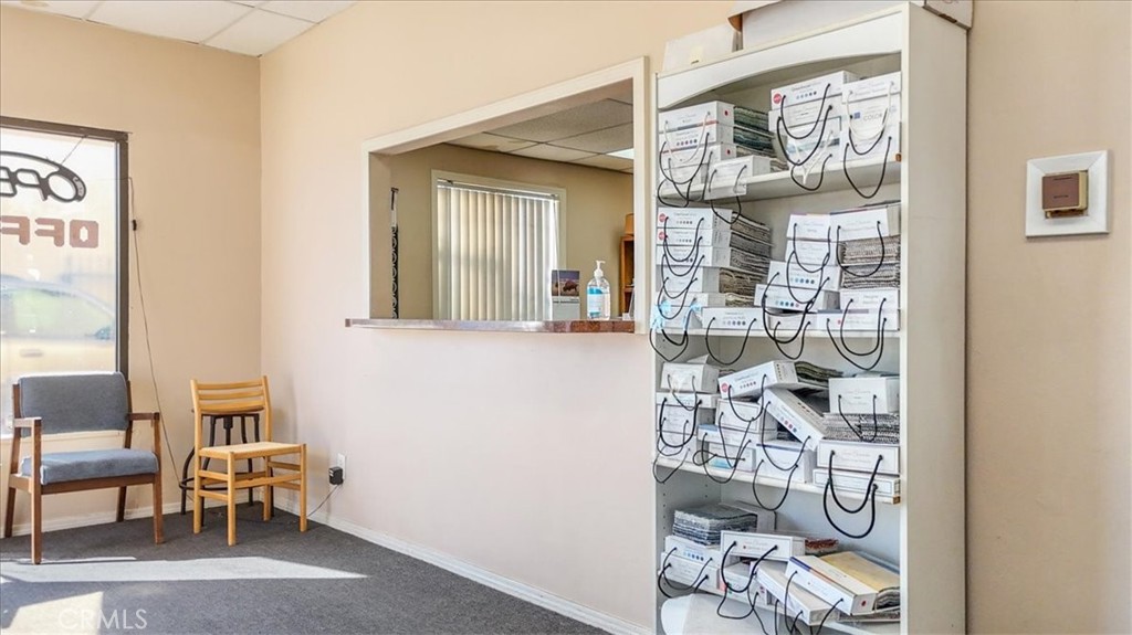 9706 Alondra Boulevard Bellflower, CA 90706 - Photo 10 of 24 a view of a livingroom with furniture and a window