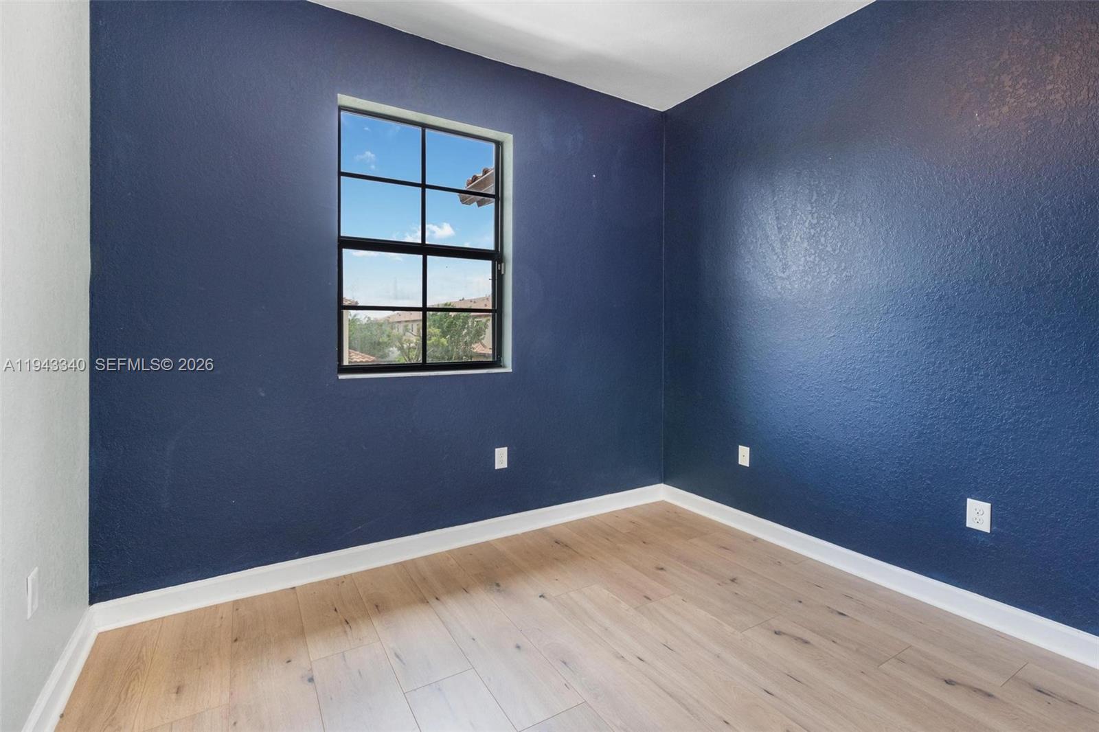 749 Southeast 32nd Terrace, Unit 749 Homestead, FL 33033 - Photo 12 of 27 an empty room and window