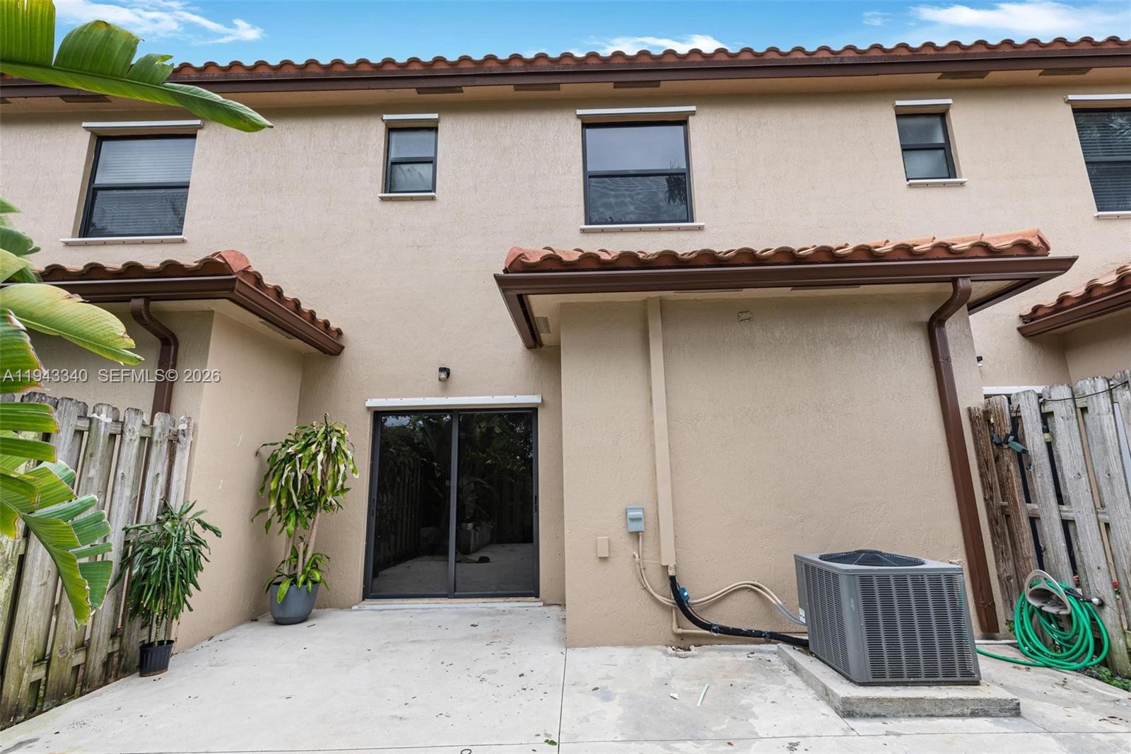 749 Southeast 32nd Terrace, Unit 749 Homestead, FL 33033 - Photo 24 of 27 a front view of a house