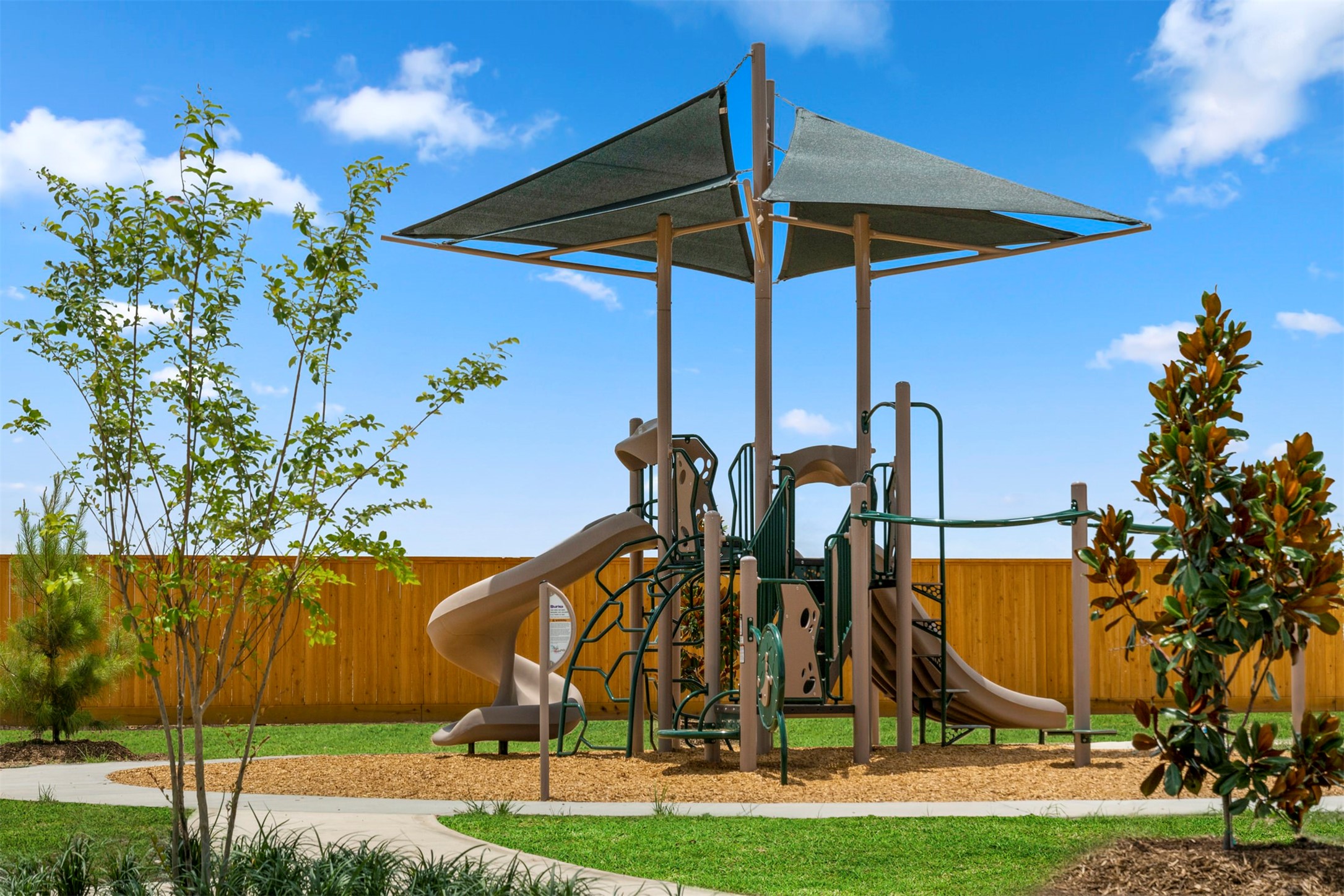 3007 Cronus Way Fresno, TX 77545 - Photo 4 of 5 a view of a park with a slide