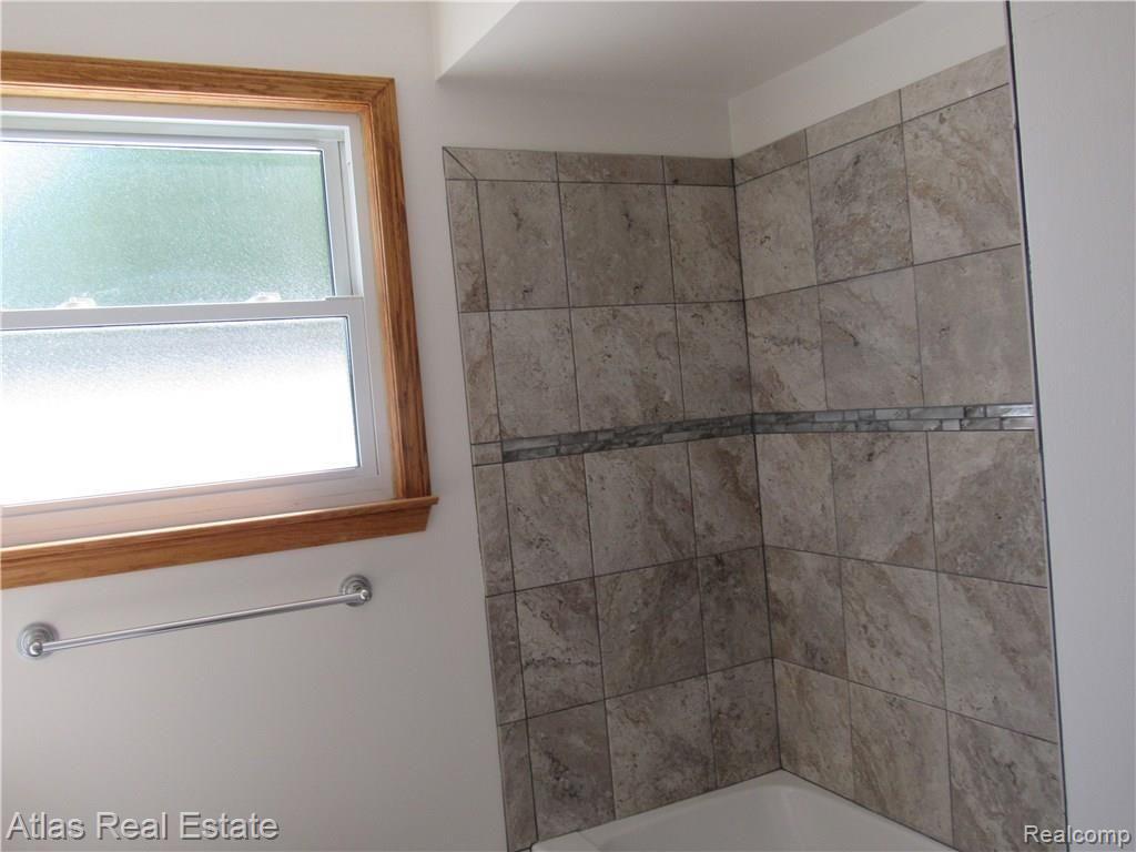 4437 Belsay Road Grand Blanc, MI 48439 - Photo 8 of 15 shower.JPG