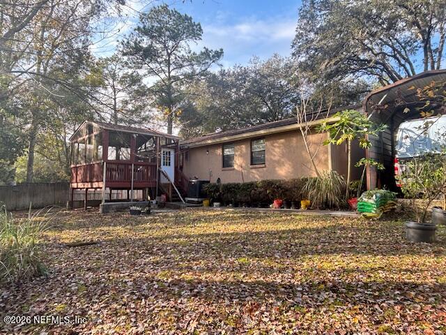 6626 Arrowroot Drive Jacksonville, FL 32244 - Photo 22 of 23 a view of a house with a yard