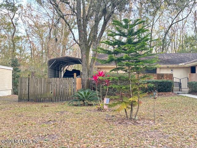 6626 Arrowroot Drive Jacksonville, FL 32244 - Photo 3 of 23 a view of a backyard house with a patio
