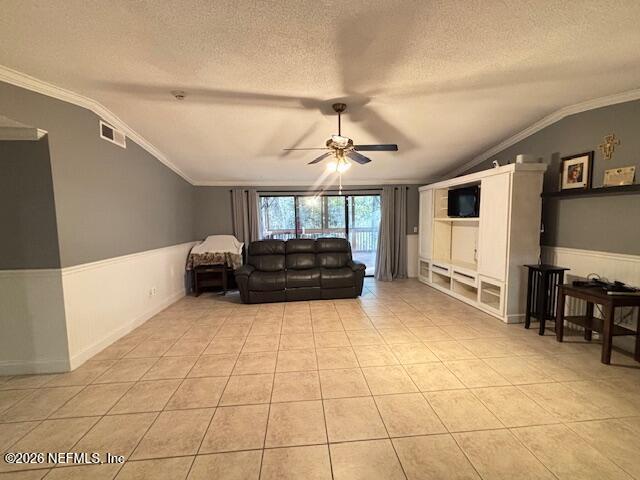 6626 Arrowroot Drive Jacksonville, FL 32244 - Photo 5 of 23 a living room with furniture and a flat screen tv