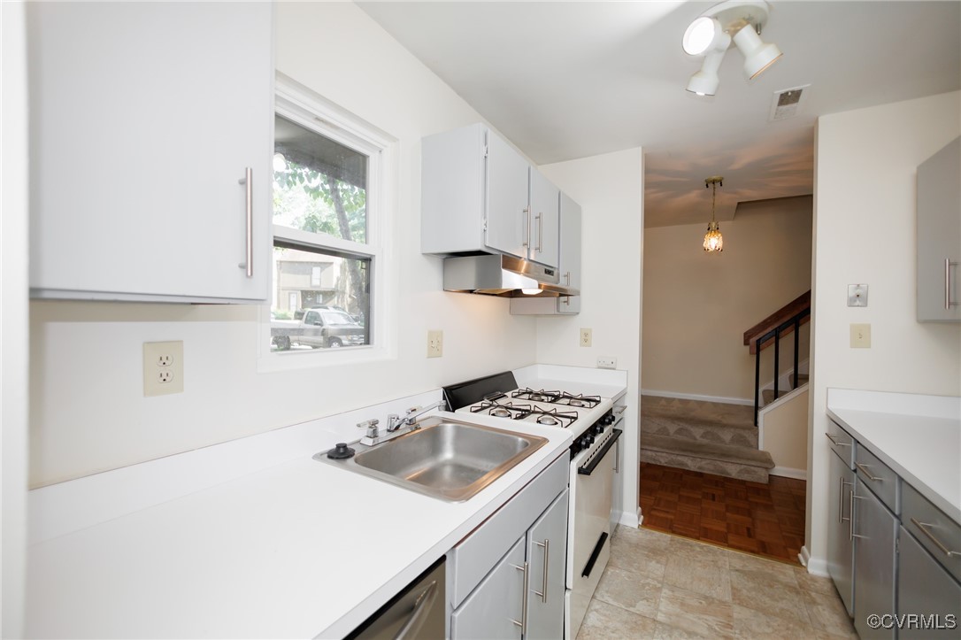 11808 North Briar Patch Drive Midlothian, VA 23113 - Photo 14 of 42 a kitchen that has a sink a stove and a window