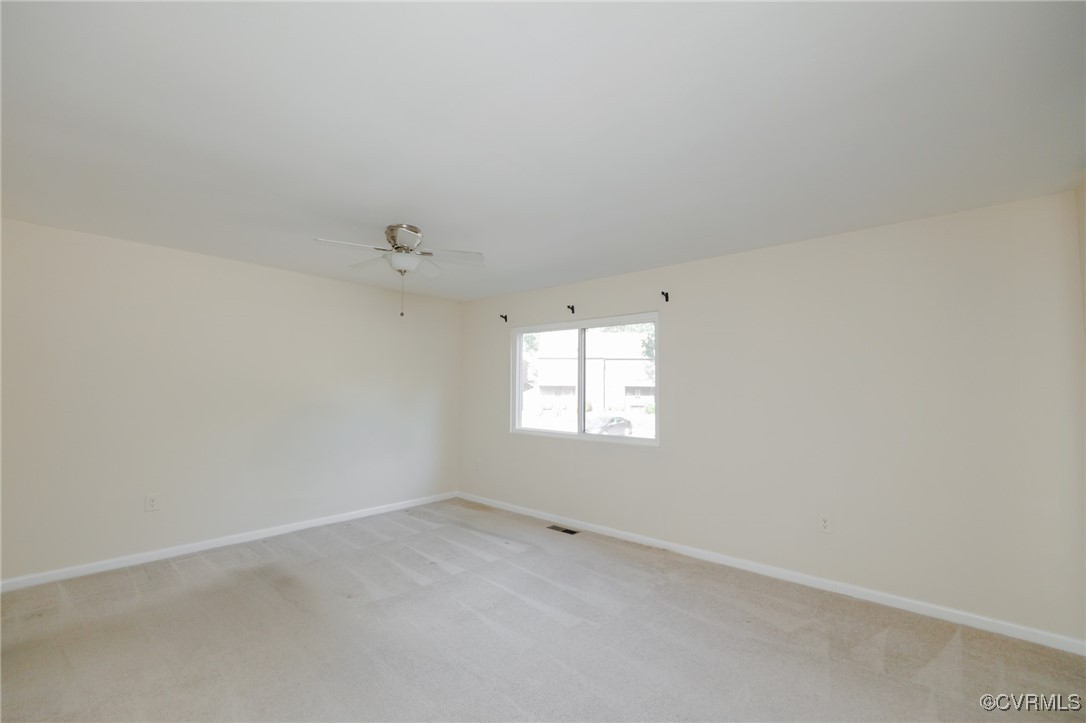 11808 North Briar Patch Drive Midlothian, VA 23113 - Photo 23 of 42 an empty room with a window