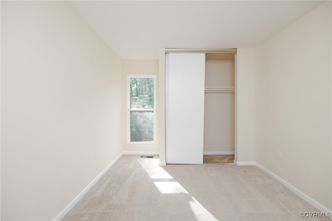 11808 North Briar Patch Drive Midlothian, VA 23113 - Photo 37 of 42 a view of an empty room with a window