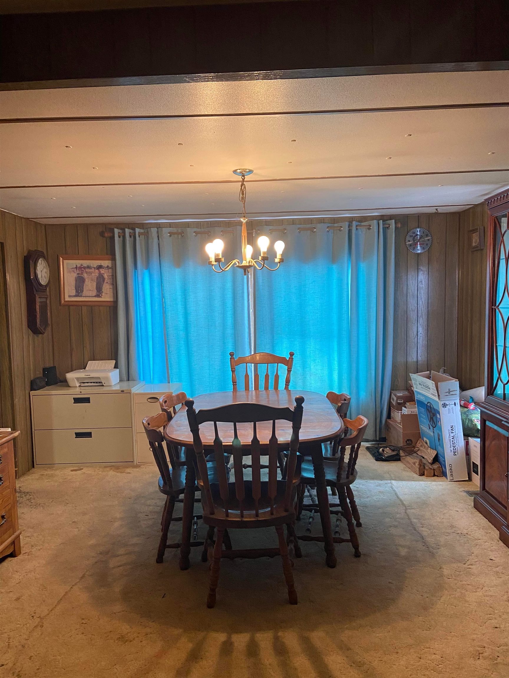710 S Road Mack, CO 81525 - Photo 3 of 9 a view of a dining room with furniture and chandelier