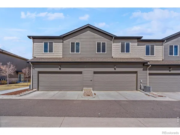 a black and white photo of a house