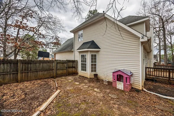 a front view of a house with a garage