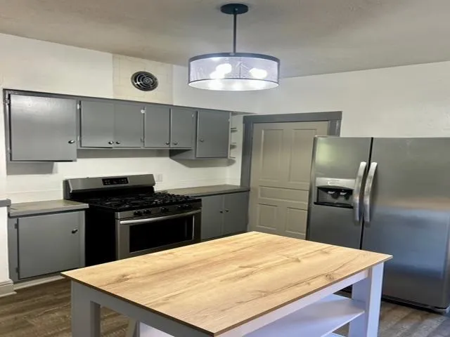 a room with a sink and a mirror