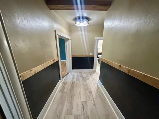 a bathroom with a sink toilet and mirror