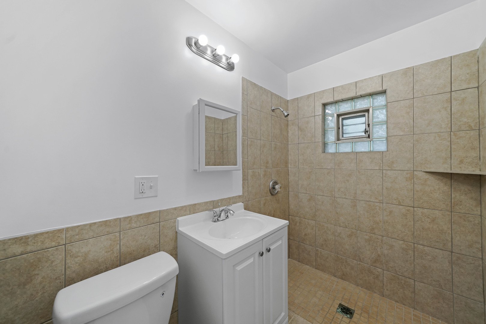1441 Burr Oak Road Homewood, IL 60430 - Photo 11 of 27 a bathroom with a toilet sink and mirror