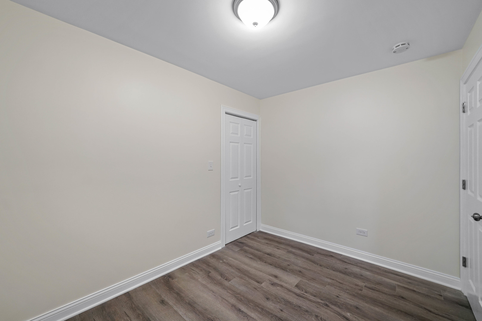 1441 Burr Oak Road Homewood, IL 60430 - Photo 13 of 27 a view of an empty room with wooden floor