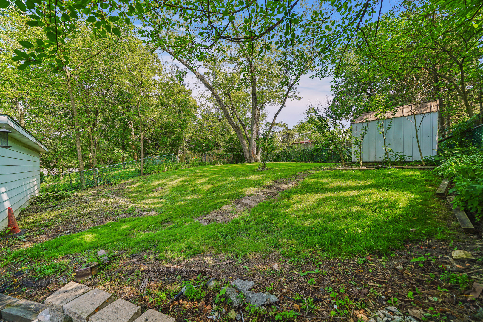 1441 Burr Oak Road Homewood, IL 60430 - Photo 23 of 27 a backyard of a house with lots of green space