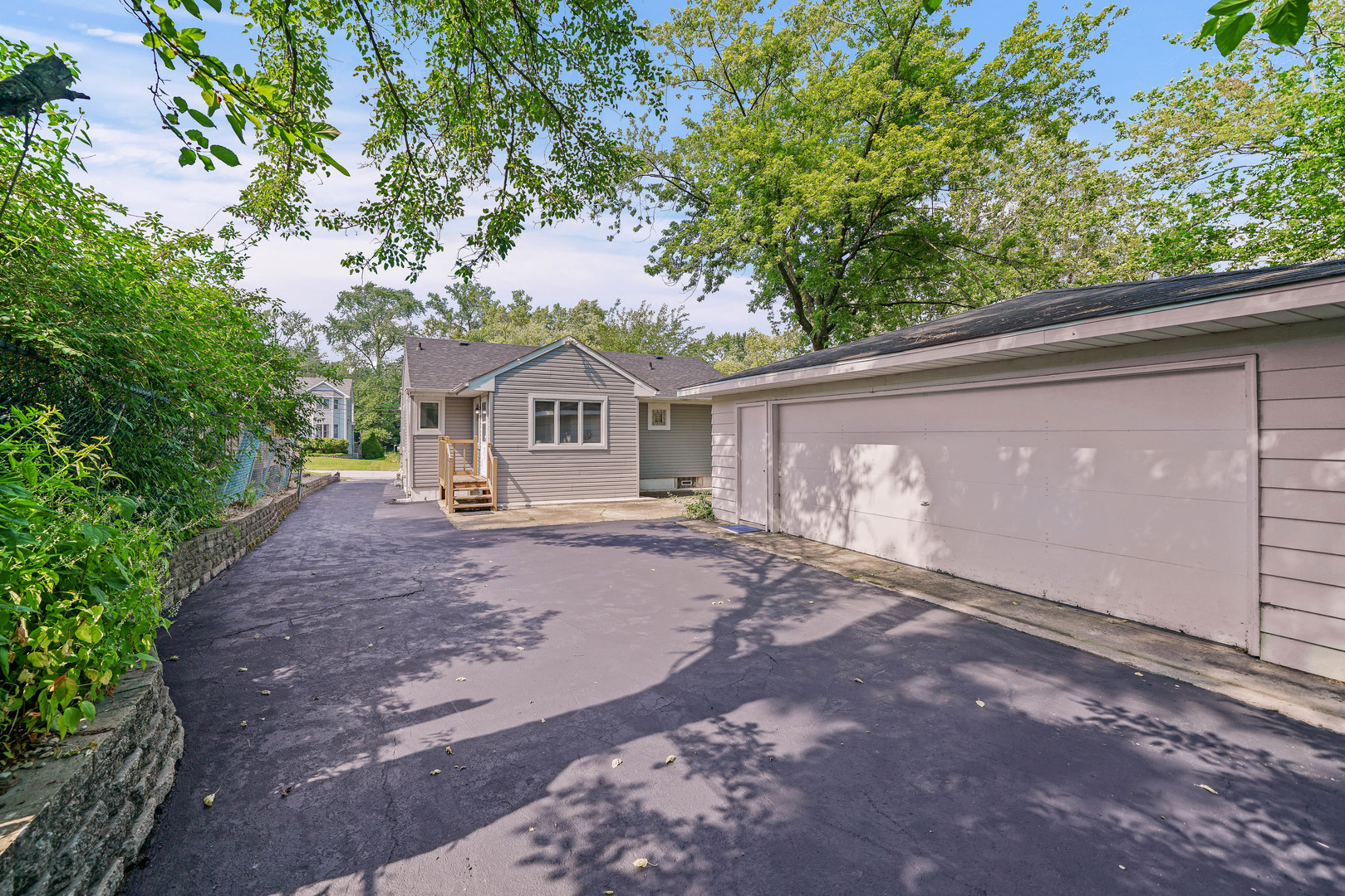 1441 Burr Oak Road Homewood, IL 60430 - Photo 24 of 27 a front view of a house with garden