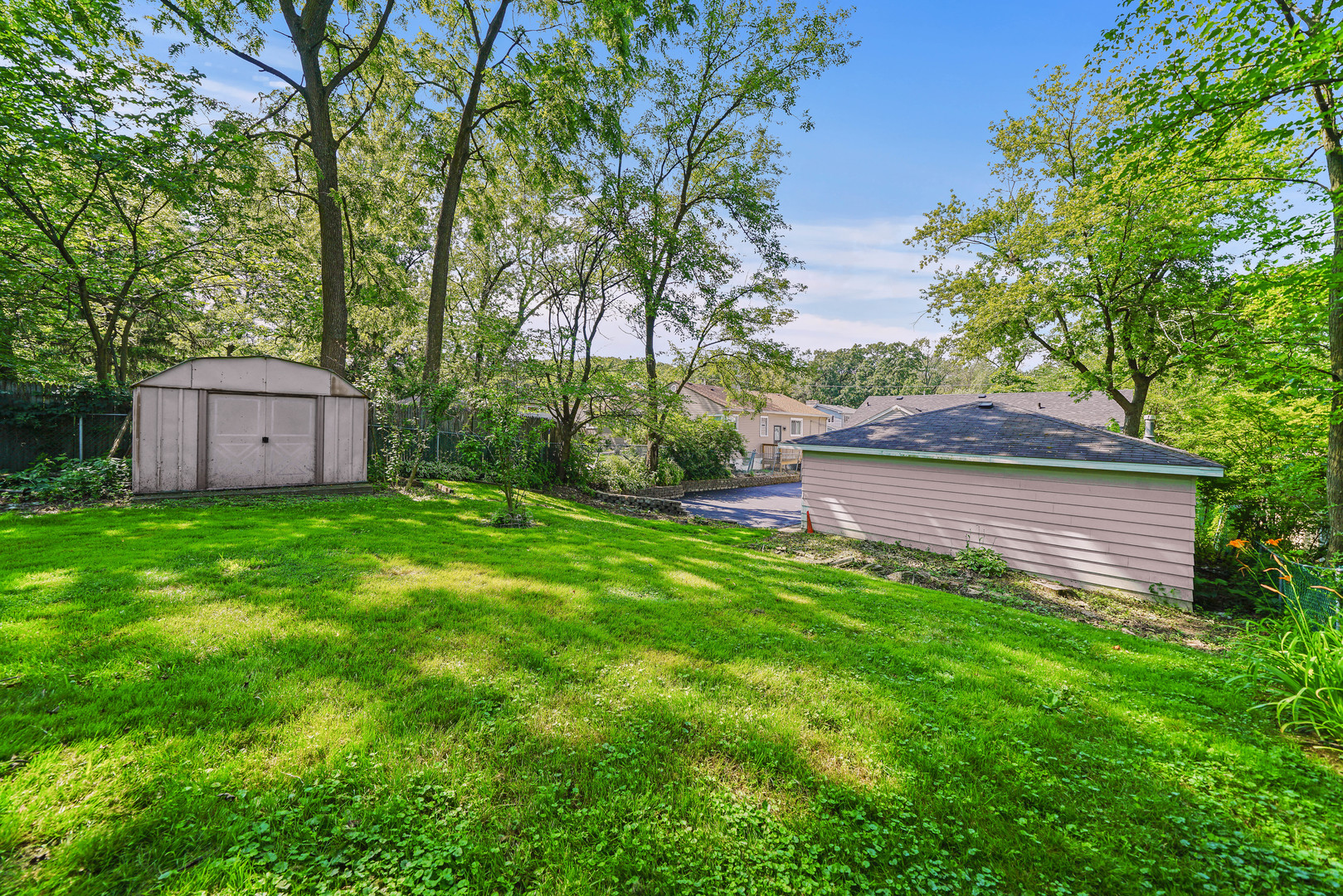 1441 Burr Oak Road Homewood, IL 60430 - Photo 25 of 27 a view of a backyard with a garden