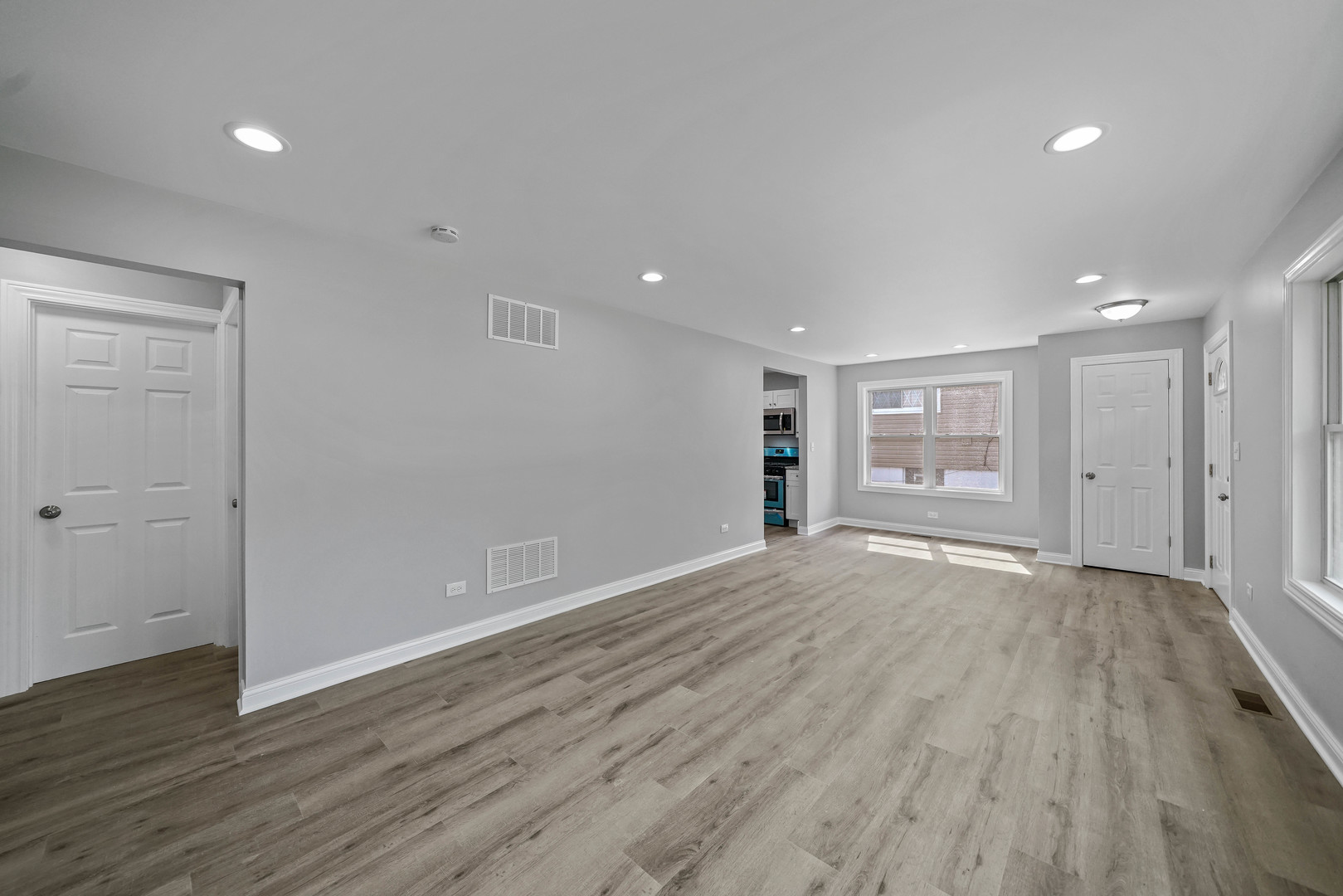 1441 Burr Oak Road Homewood, IL 60430 - Photo 7 of 27 a view of an empty room with wooden floor