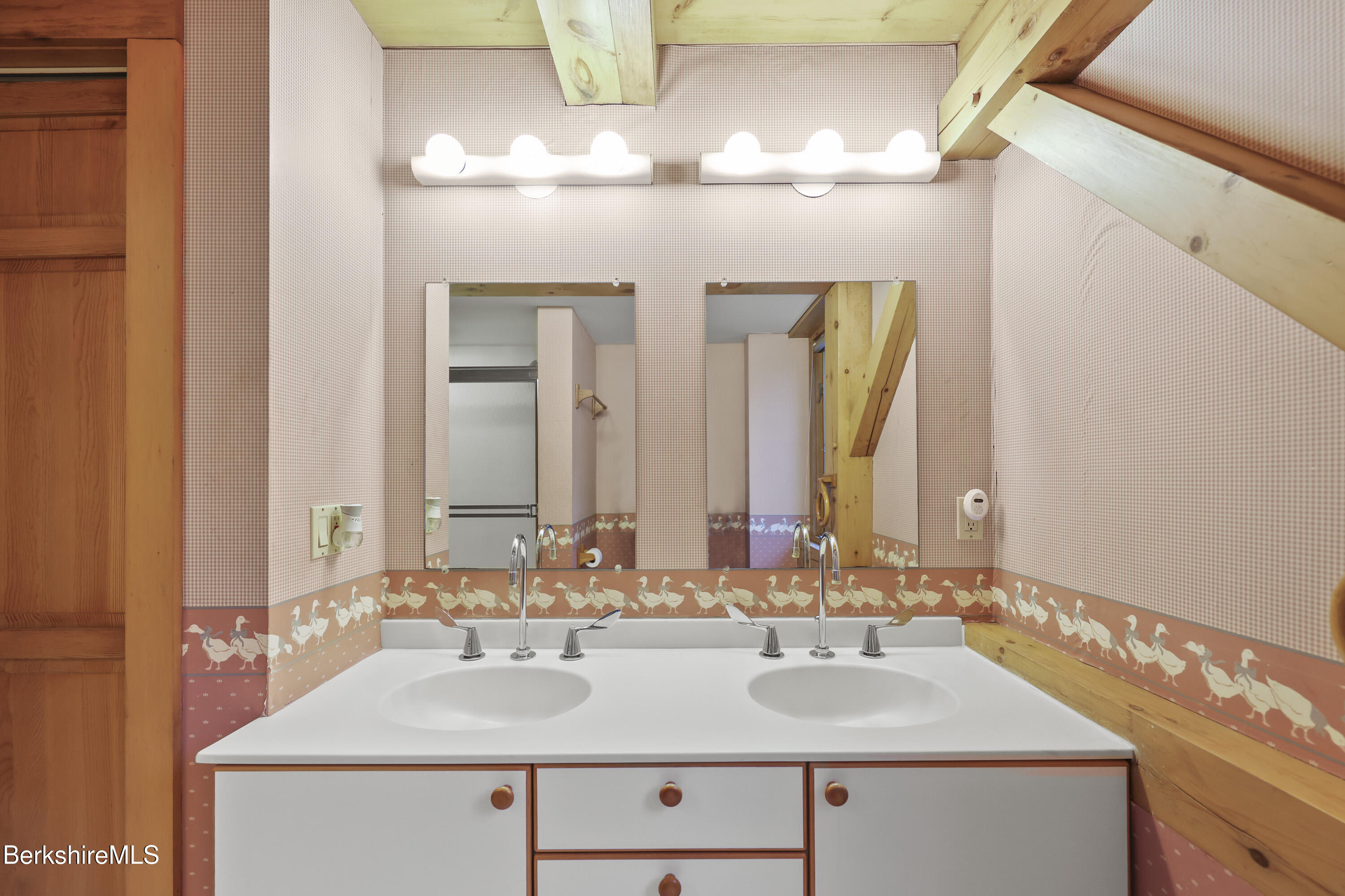 1030 Simonds Road Williamstown, MA 01267 - Photo 45 of 76 a bathroom with a sink and a mirror