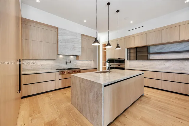 a bathroom with a tub sink and shower