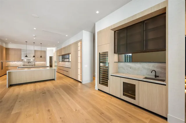 a bathroom with a toilet sink and a mirror