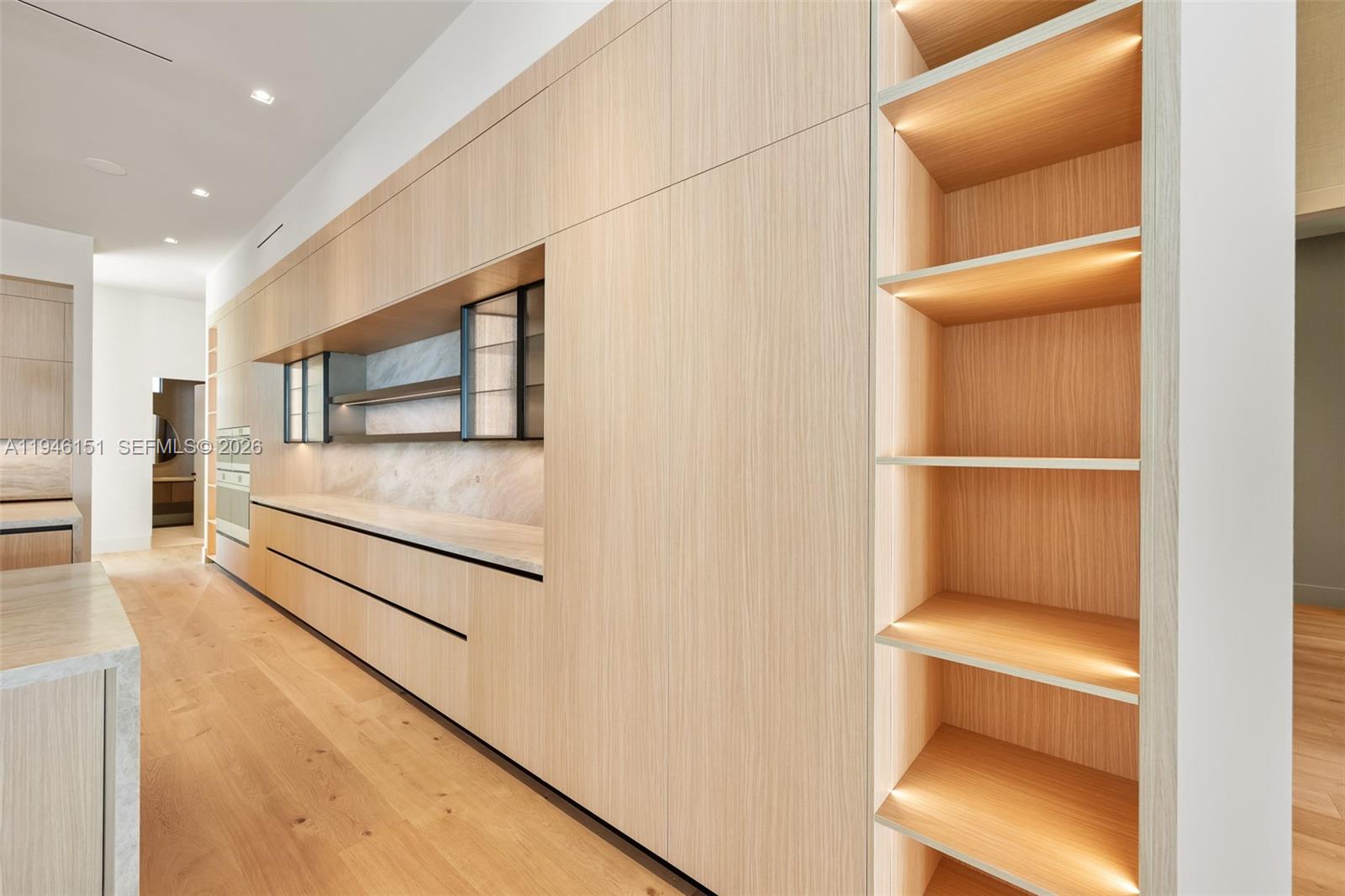 7725 Southwest 114th Street Pinecrest, FL 33156 - Photo 38 of 94 a hallway with white doors