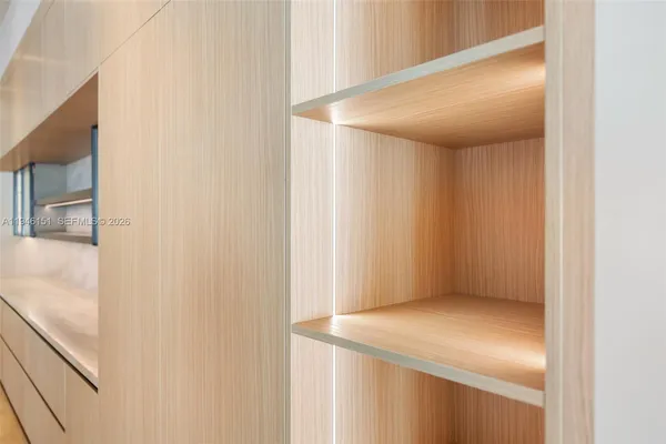 a view of livingroom with washer and dryer