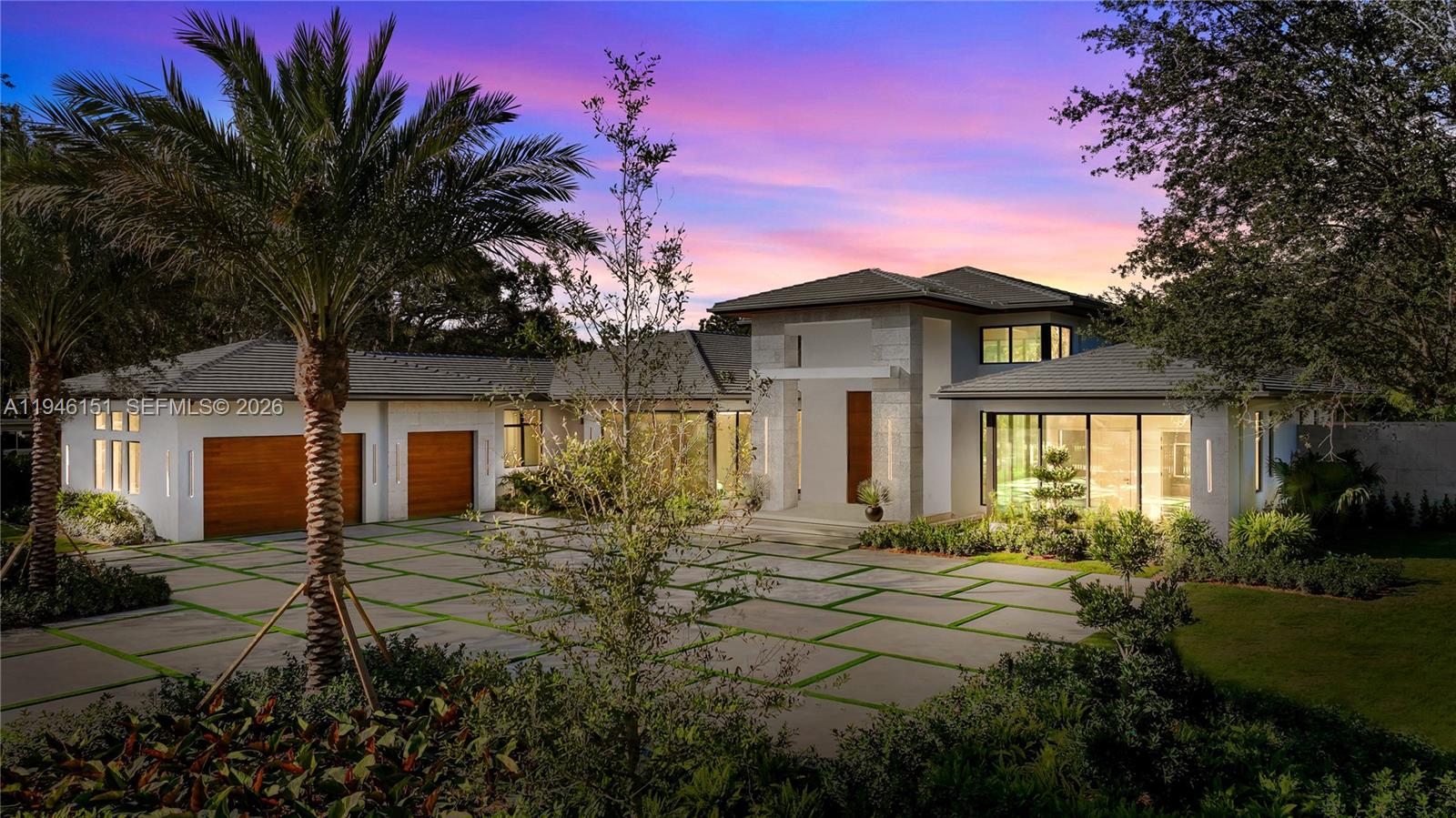 7725 Southwest 114th Street Pinecrest, FL 33156 - Photo 4 of 94 Twilight Front of Structure