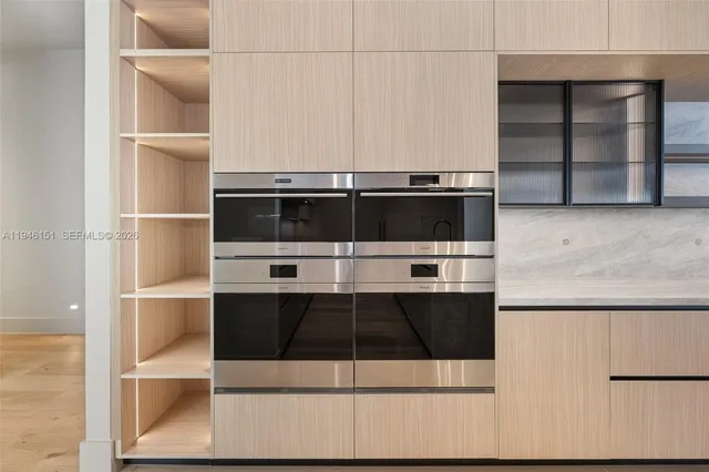 a view of a patio with swimming pool table and chairs